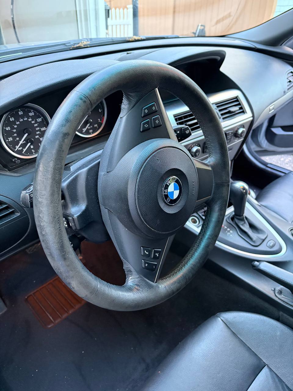 BMW 650i steering wheel before